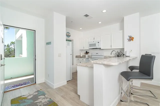 $225,000 | 8407 Placida Road, Unit 205, Placida, FL 33946