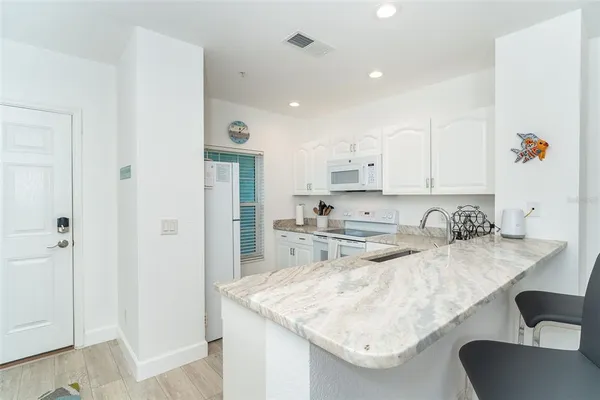 $199,999 | 8407 Placida Road, Unit 205, Placida, FL 33946