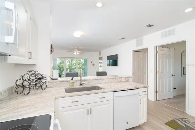 $225,000 | 8407 Placida Road, Unit 205, Placida, FL 33946