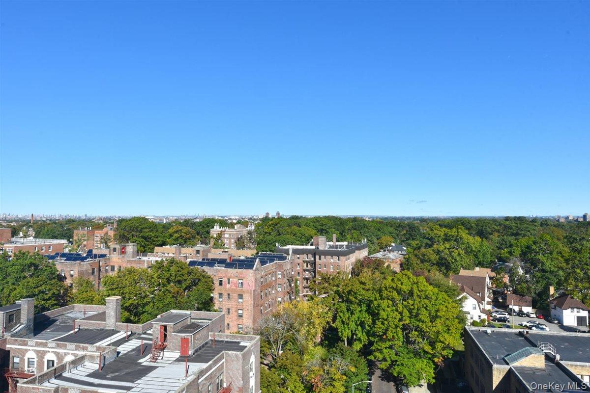 175-20 Wexford Terrace, Unit 16L Queens, NY 11432 - Photo 18 of 26 an aerial view of a city with lots of residential buildings