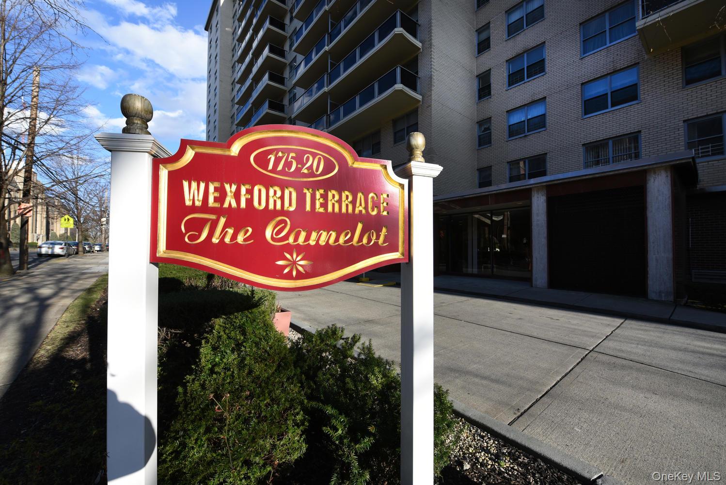 175-20 Wexford Terrace, Unit 16L Queens, NY 11432 - Photo 20 of 26 a sign on the side of a building