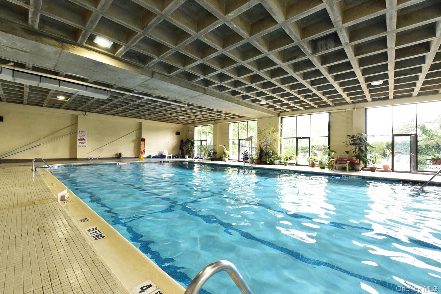 175-20 Wexford Terrace, Unit 16L Queens, NY 11432 - Photo 21 of 26 a view of a swimming pool