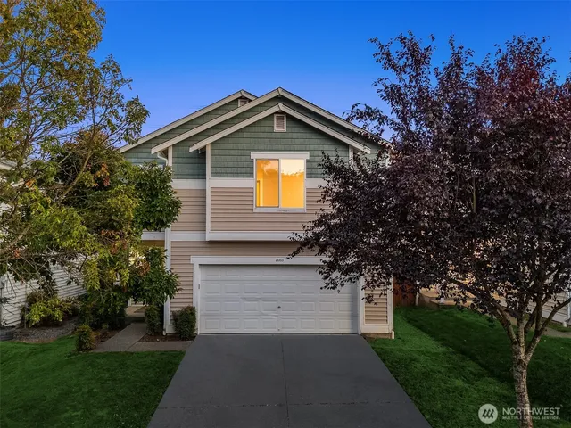a front view of house with yard