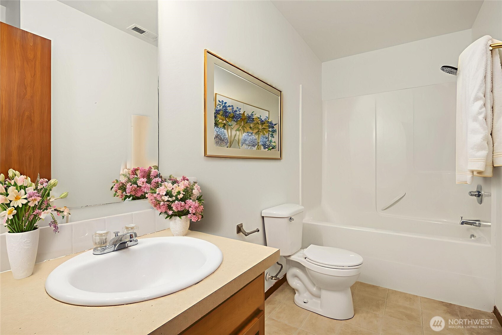 21353 Southeast 289th Way Kent, WA 98042 - Photo 13 of 40 a bathroom with a sink mirror and a toilet