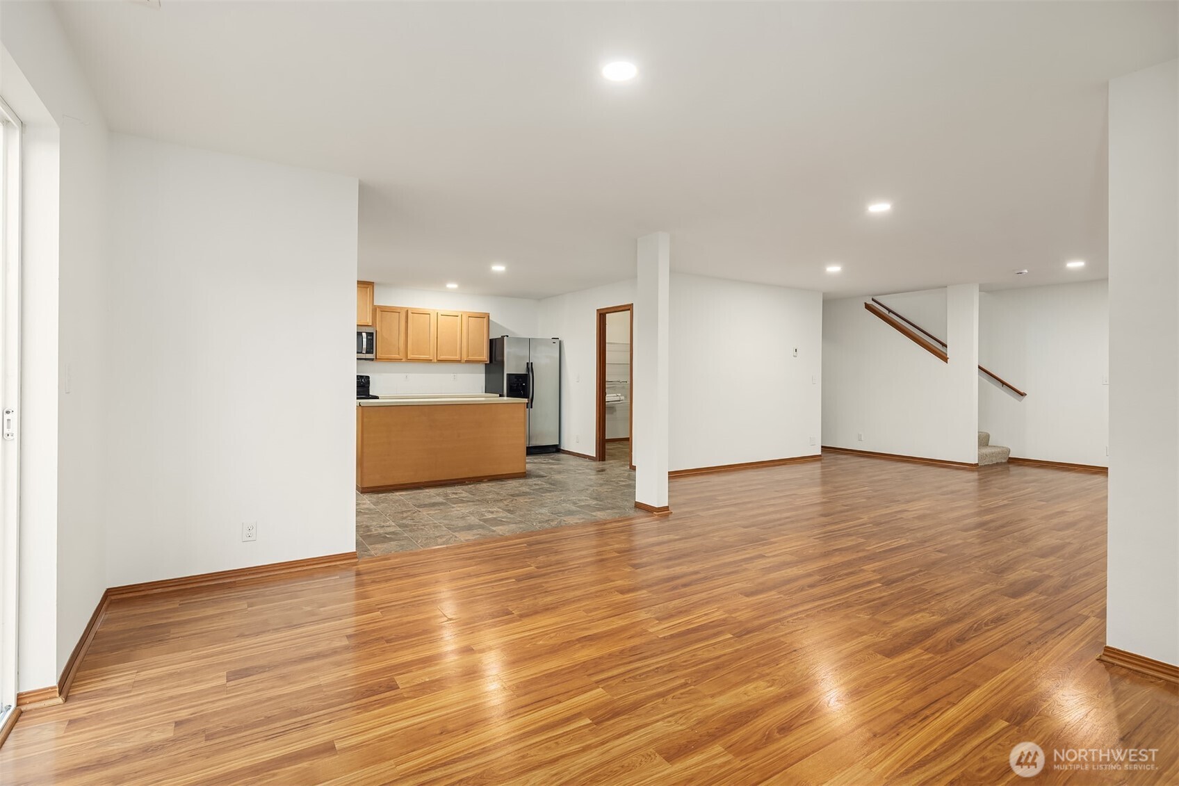 21353 Southeast 289th Way Kent, WA 98042 - Photo 18 of 40 a view of a kitchen with a sink and a refrigerator