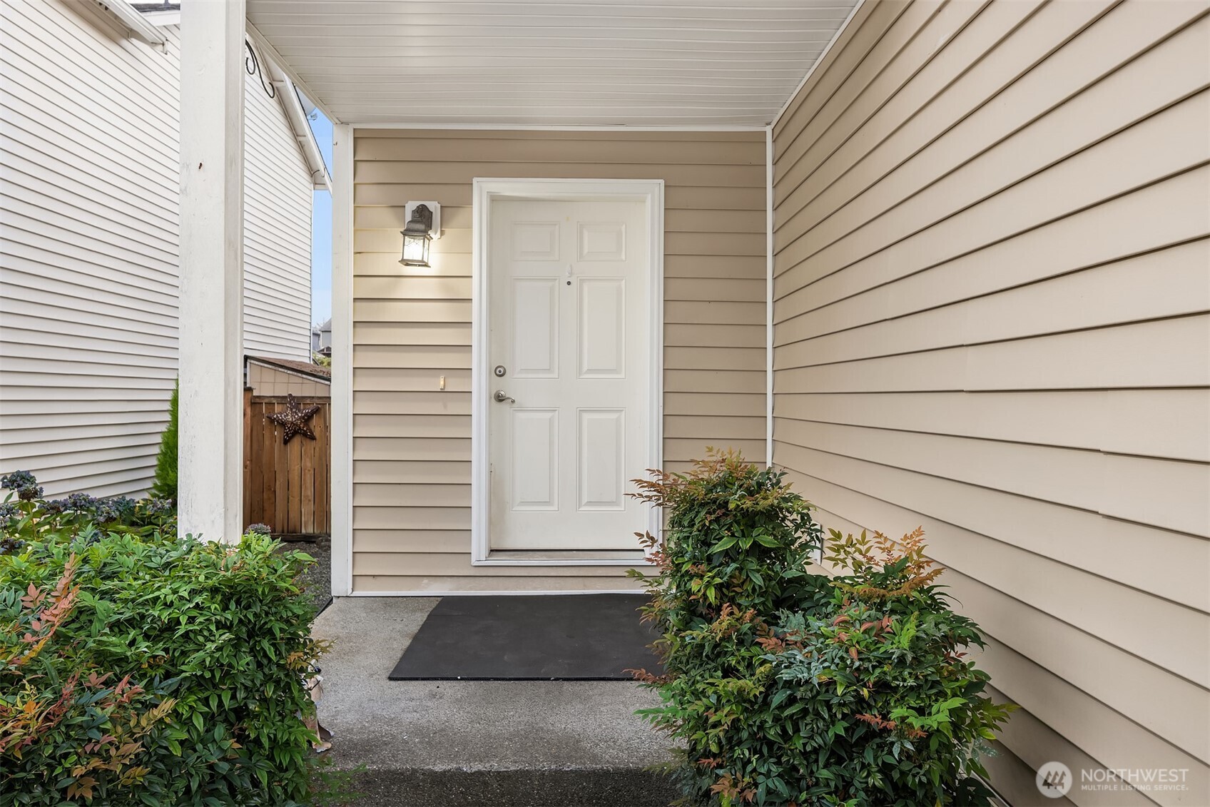 21353 Southeast 289th Way Kent, WA 98042 - Photo 2 of 40 a potted plant sitting in front of a house