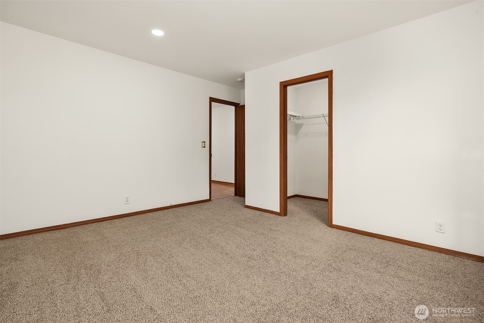 21353 Southeast 289th Way Kent, WA 98042 - Photo 25 of 40 an empty room with closet and closet