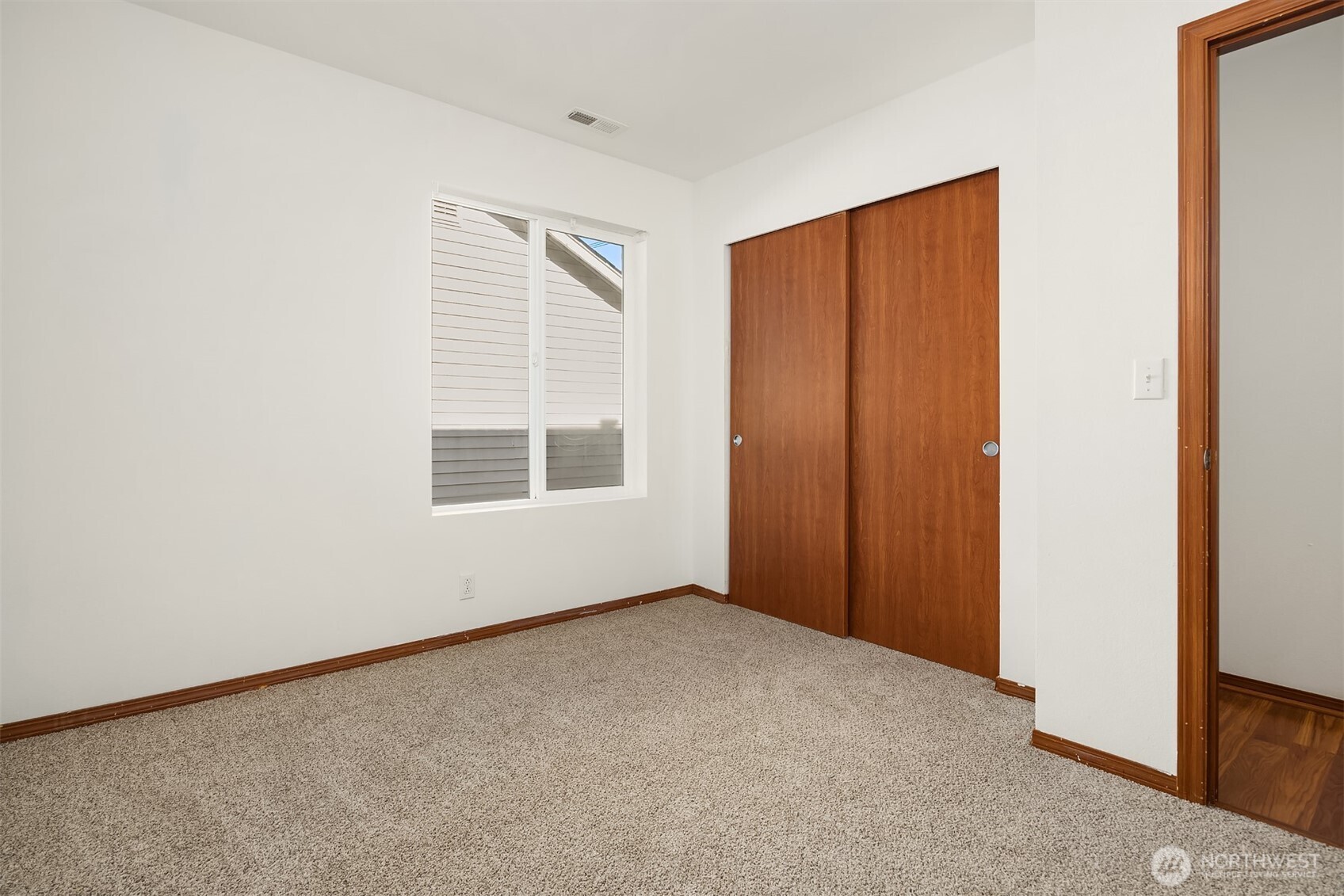 21353 Southeast 289th Way Kent, WA 98042 - Photo 28 of 40 an empty room with windows