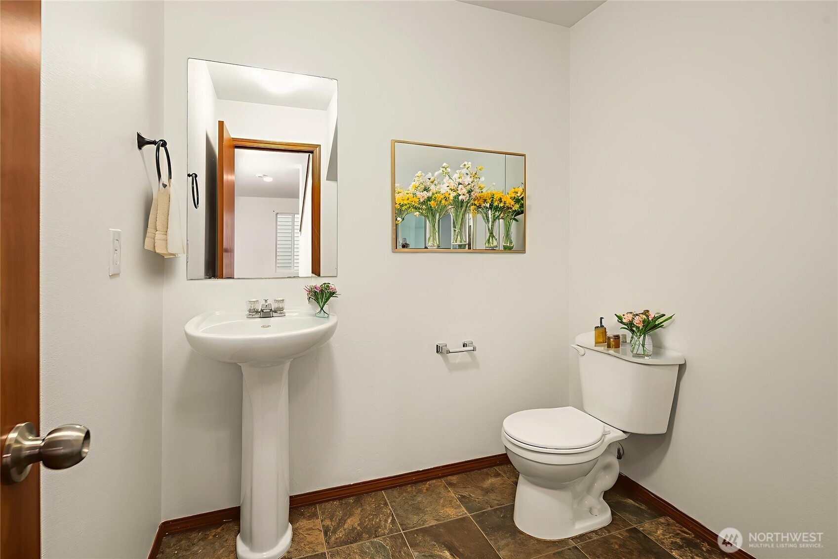 21353 Southeast 289th Way Kent, WA 98042 - Photo 6 of 40 a bathroom with a toilet sink and mirror