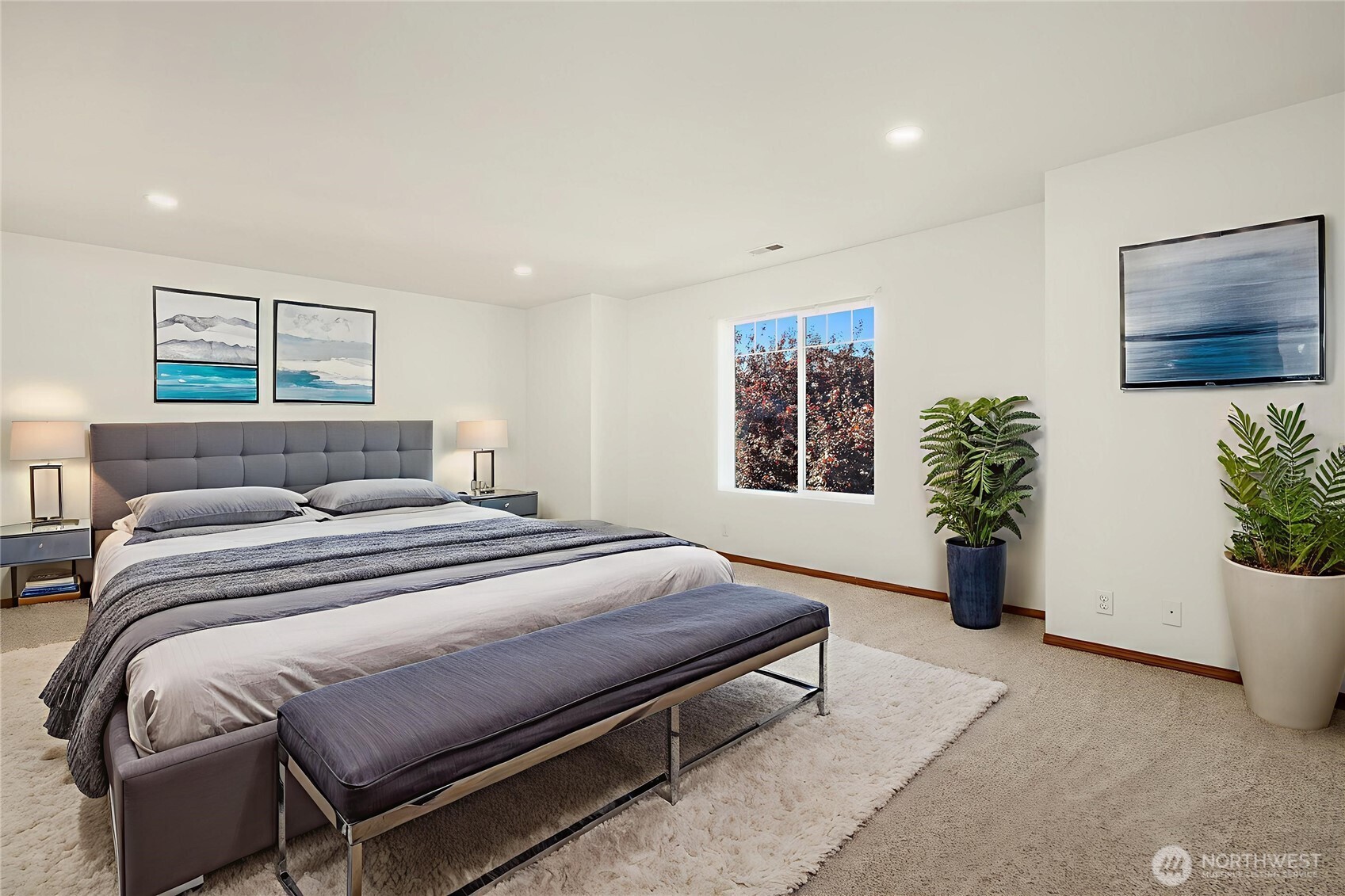 21353 Southeast 289th Way Kent, WA 98042 - Photo 7 of 40 a spacious bedroom with a bed and a potted plant