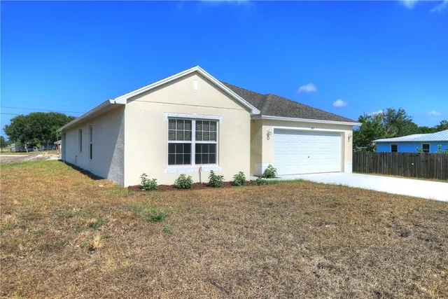 a view of backyard of house