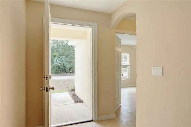 a view of a bathroom from a hallway