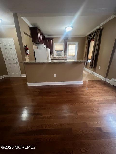 20-28 East Main Street, Unit 6 Freehold, NJ 07728 - Photo 4 of 11 a view of a livingroom with furniture wooden floor and window