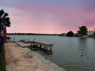 a view of a lake from a balcony