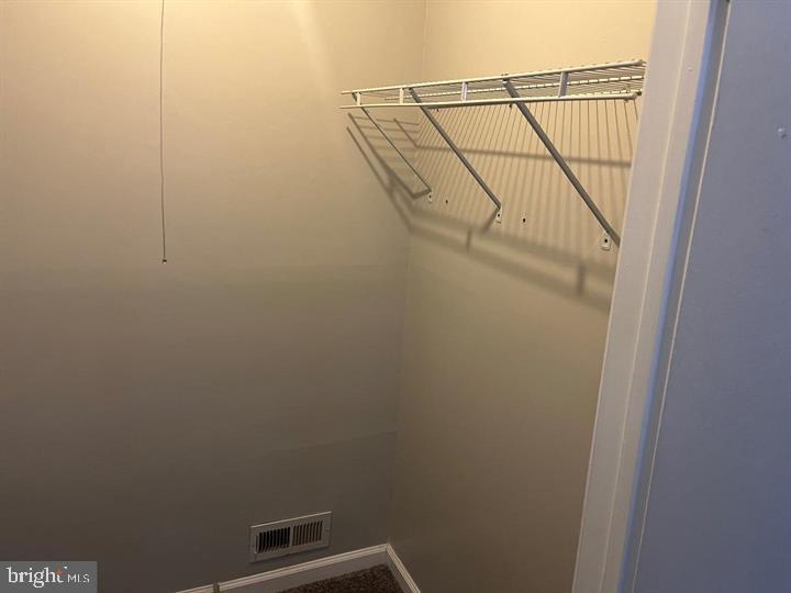 11 Kent Place Sewell, NJ 08080 - Photo 15 of 19 a view of storage and utility room with racks on the wall