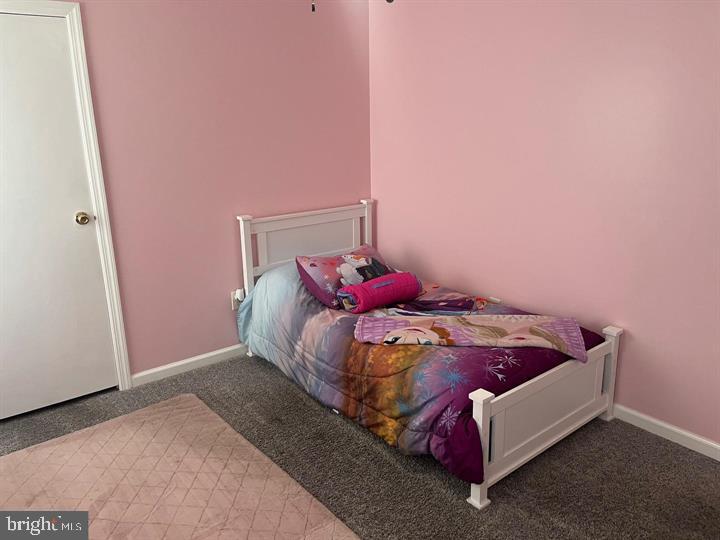 11 Kent Place Sewell, NJ 08080 - Photo 19 of 19 a bed sitting in a bedroom next to a window