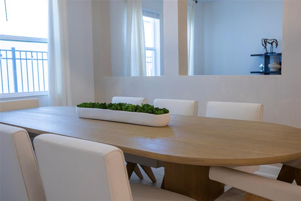 4507 Hillingdam Road Davenport, FL 33837 - Photo 30 of 83 a view of a dining room with furniture