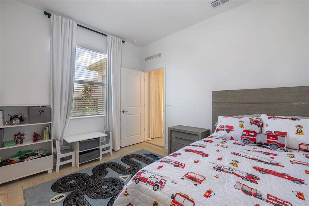 4507 Hillingdam Road Davenport, FL 33837 - Photo 33 of 83 a bedroom with a bed and a window