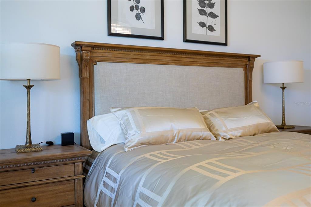 4507 Hillingdam Road Davenport, FL 33837 - Photo 39 of 83 a bedroom with a bed and a lamp on dresser