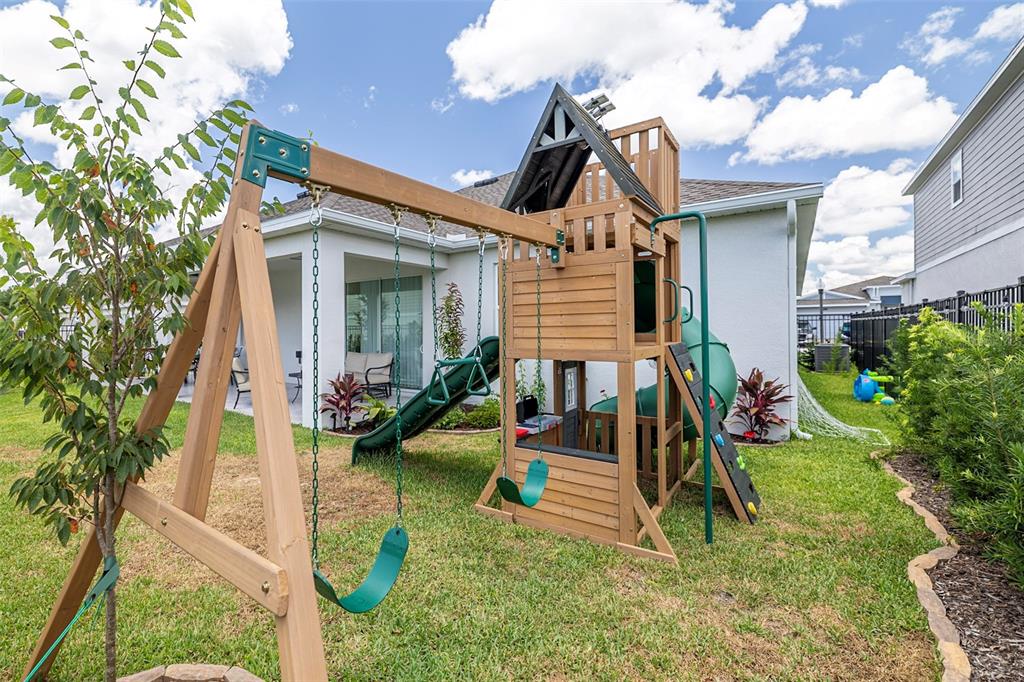 4507 Hillingdam Road Davenport, FL 33837 - Photo 49 of 83 a view of house with a yard and entertaining space