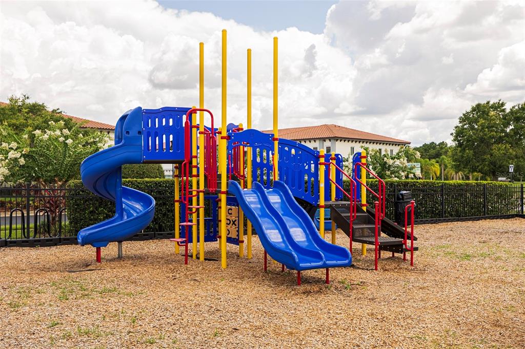 4507 Hillingdam Road Davenport, FL 33837 - Photo 60 of 83 a view of a park with slide and a bench