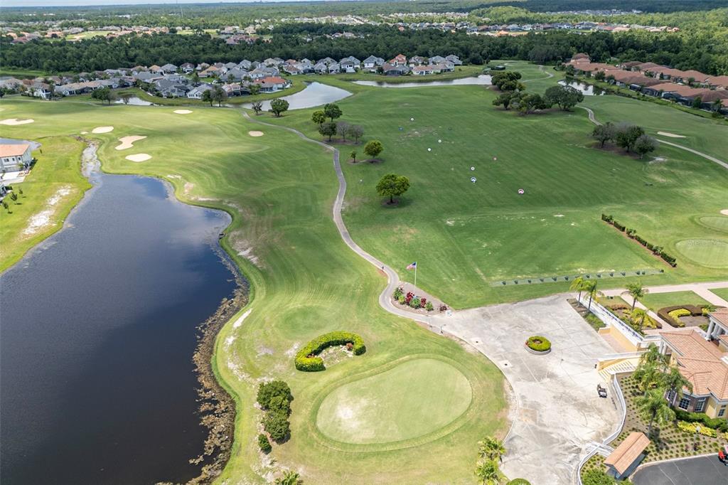 4507 Hillingdam Road Davenport, FL 33837 - Photo 66 of 83 an aerial view of a house with a swimming pool yard and lake view