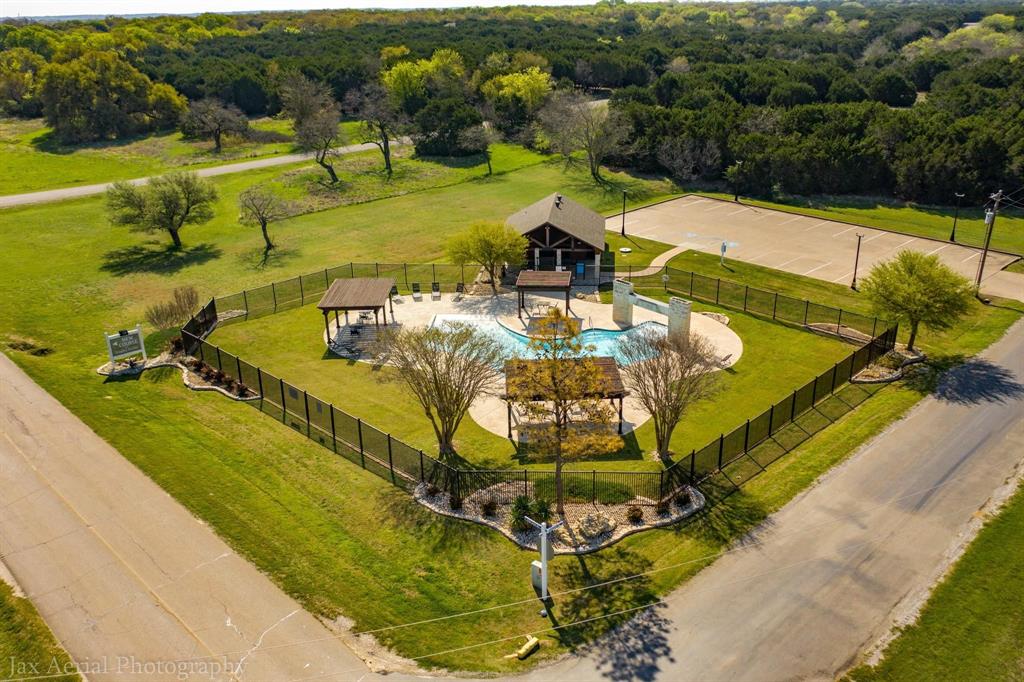 42018 Preston Trail Whitney, TX 76692 - Photo 11 of 29 a view of a swimming pool with a patio