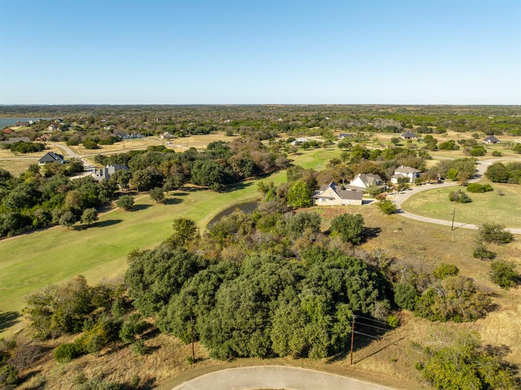 42018 Preston Trail Whitney, TX 76692 - Photo 7 of 29 an aerial view of residential houses with outdoor space