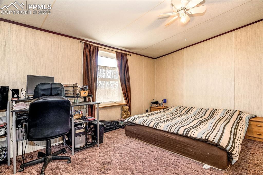 34430 East Jones Road Yoder, CO 80864 - Photo 12 of 41 Master Suite offers Eastern Light and Ceiling Fan.
