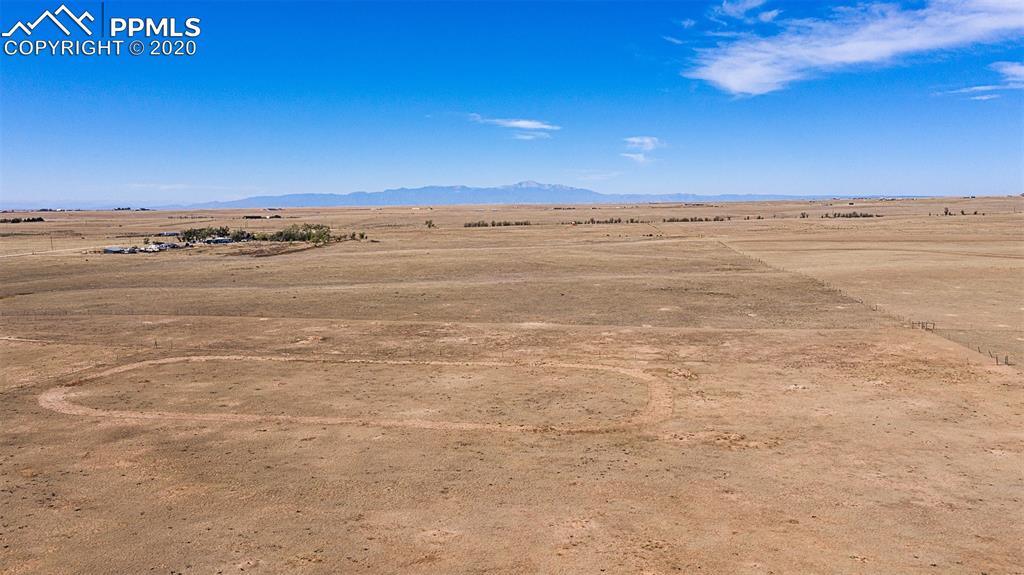 34430 East Jones Road Yoder, CO 80864 - Photo 33 of 41 The Oval Shape you see is the practice horse gait track! Check out the Rocky Mountains and Pikes Peak!!!