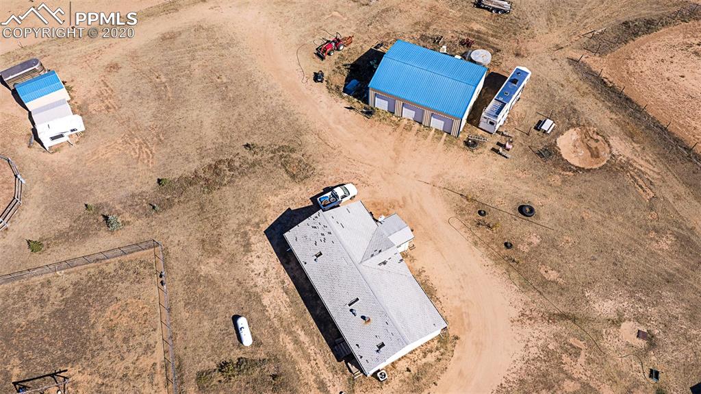 34430 East Jones Road Yoder, CO 80864 - Photo 40 of 41 Over Head View of Home, Garage/Shop and Sheds-New ROOF coming soon!
