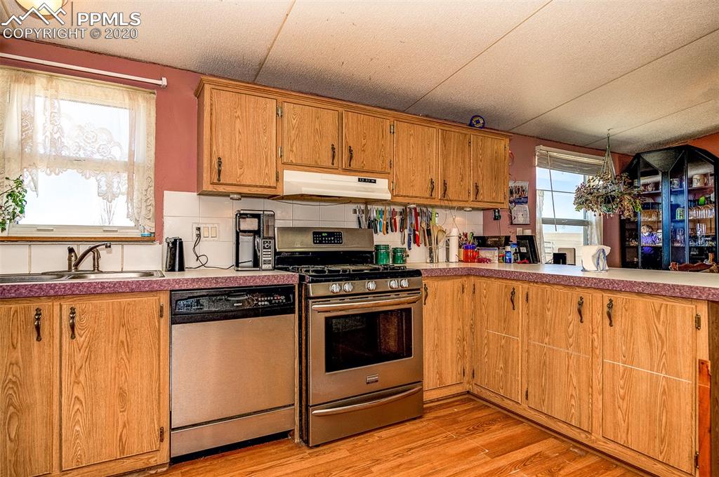 34430 East Jones Road Yoder, CO 80864 - Photo 8 of 41 Newer Stainless Steel Dishwasher and 5 Burner Gas Range & Convection Stove