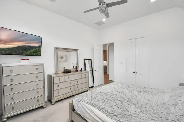 an aerial view of a house with a garden and plants