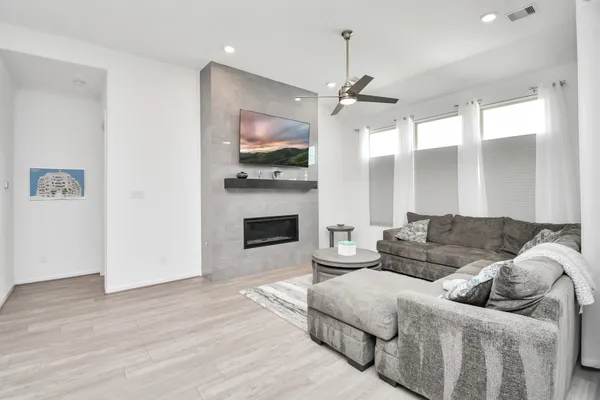 a kitchen with stainless steel appliances kitchen island a cabinets and wooden floor