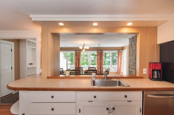 2 Ardsley Road Longmeadow, MA 01106 - Photo 11 of 30 a bathroom with a sink and a large mirror