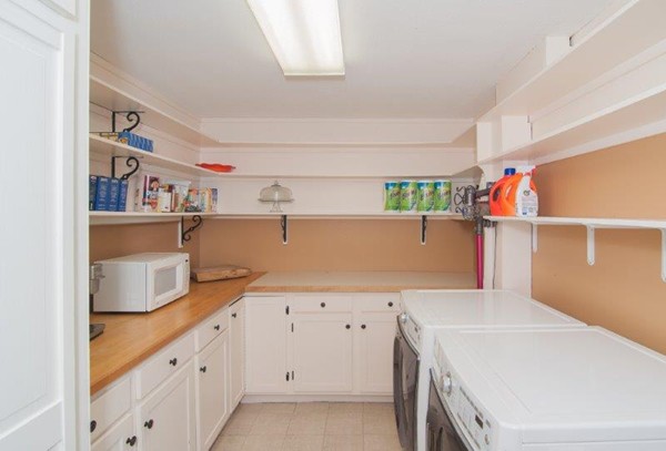 2 Ardsley Road Longmeadow, MA 01106 - Photo 13 of 30 a kitchen with a cabinets and wooden floor