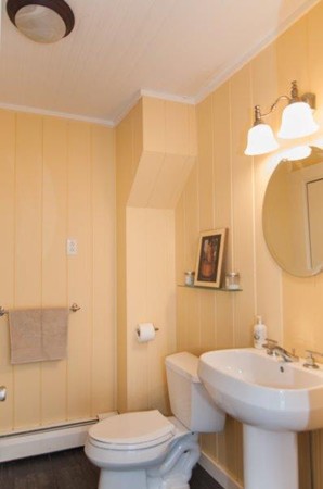 2 Ardsley Road Longmeadow, MA 01106 - Photo 15 of 30 a bathroom with a sink a toilet and a mirror