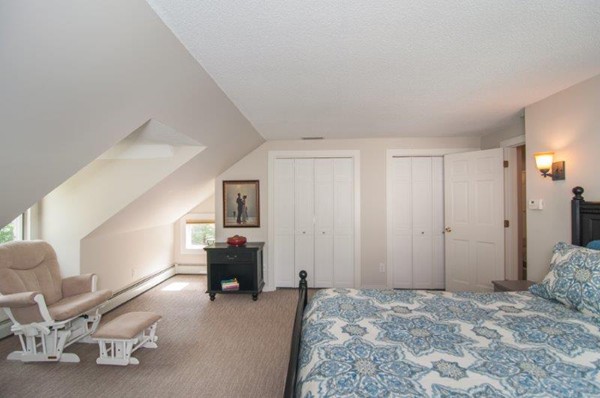 2 Ardsley Road Longmeadow, MA 01106 - Photo 17 of 30 a bedroom with furniture and a fireplace