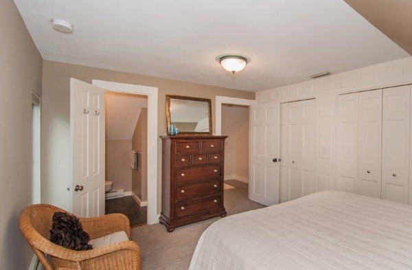 2 Ardsley Road Longmeadow, MA 01106 - Photo 19 of 30 a bedroom with a bed and a chair