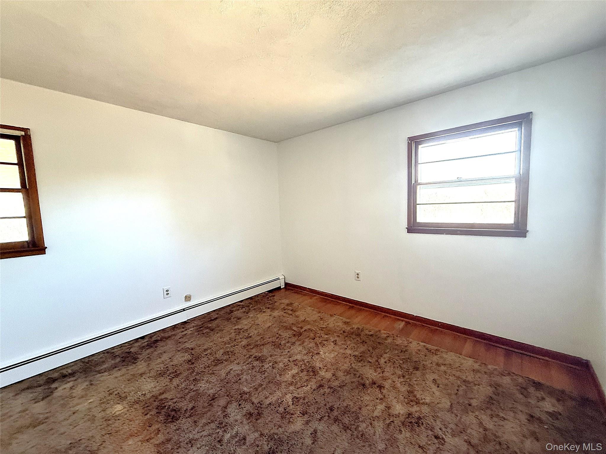 40 Walnut Street Pawling, NY 12564 - Photo 15 of 27 an empty room with a window
