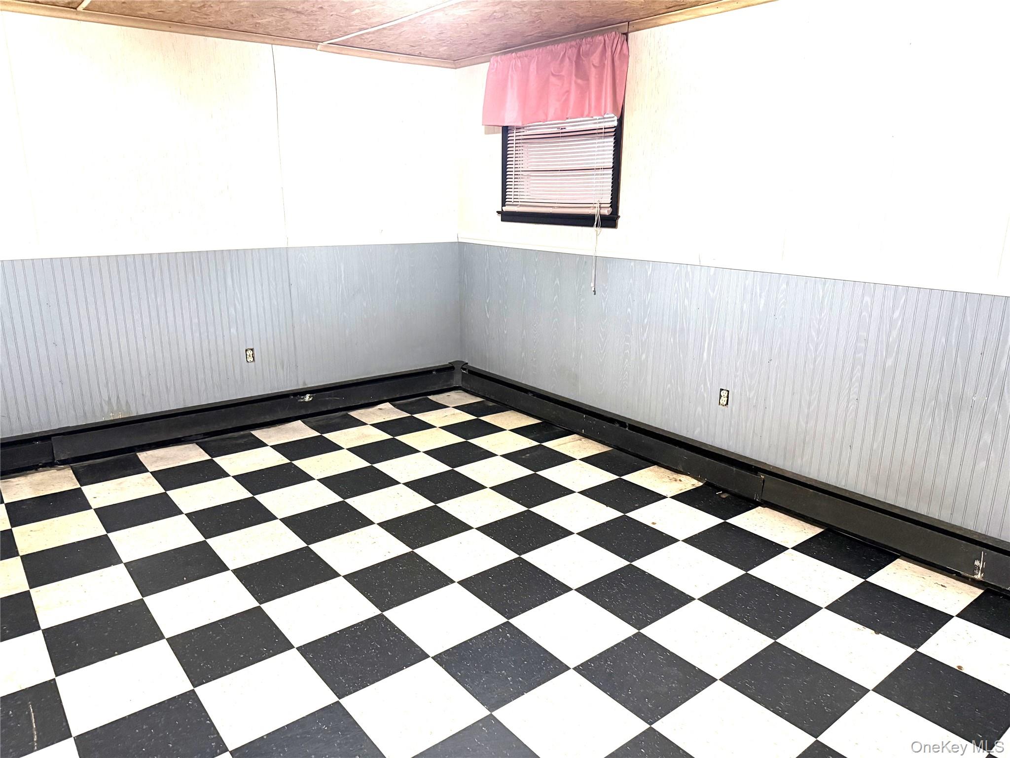 40 Walnut Street Pawling, NY 12564 - Photo 23 of 27 a black and white checkered floor with a black white checkered floor