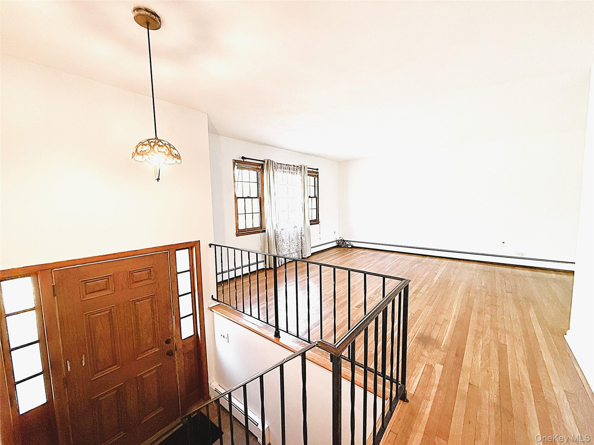 40 Walnut Street Pawling, NY 12564 - Photo 4 of 27 a view of a hallway with windows