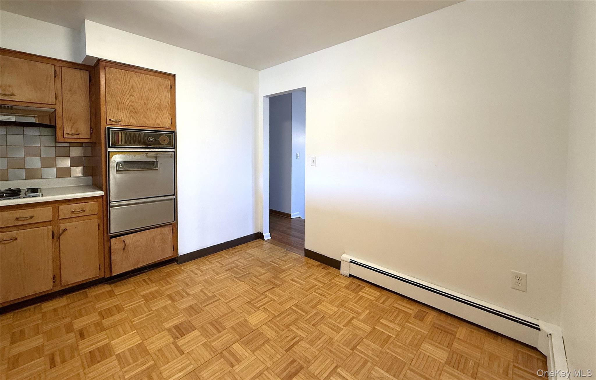 40 Walnut Street Pawling, NY 12564 - Photo 9 of 27 a view of kitchen with wooden floor and electronic appliances