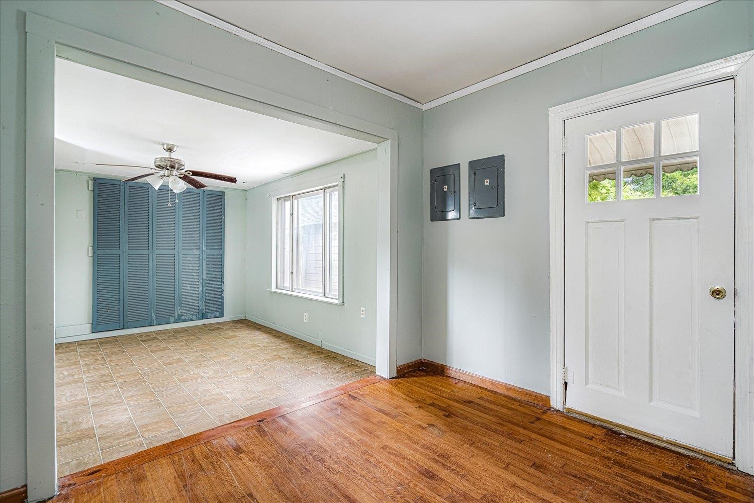 210 Kinney Avenue Covington, TN 38019 - Photo 22 of 28 a view of empty room with window and wooden floor