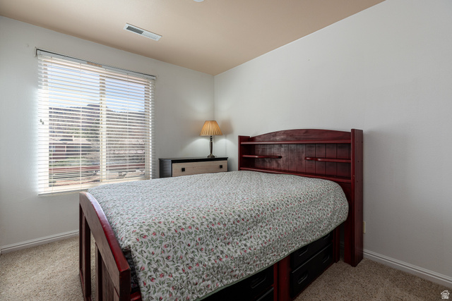 6 300th Road North, Unit I6 Kanab, UT 84741 - Photo 27 of 37 Bedroom with baseboards and light carpet