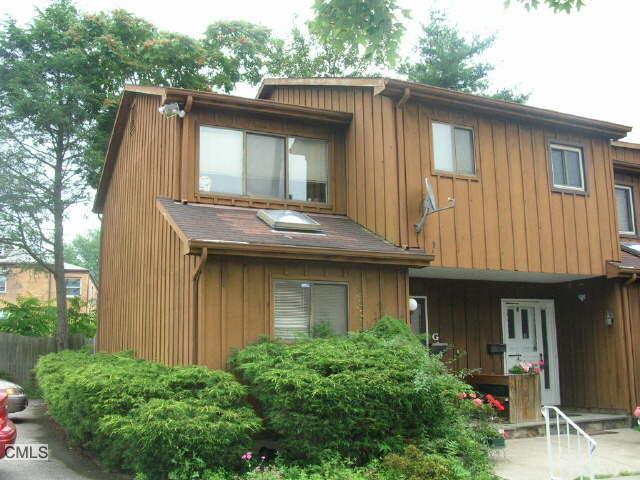 515 Fairfield Avenue, Unit G Stamford, CT 06902 - Photo 1 of 1 a house view with a garden space
