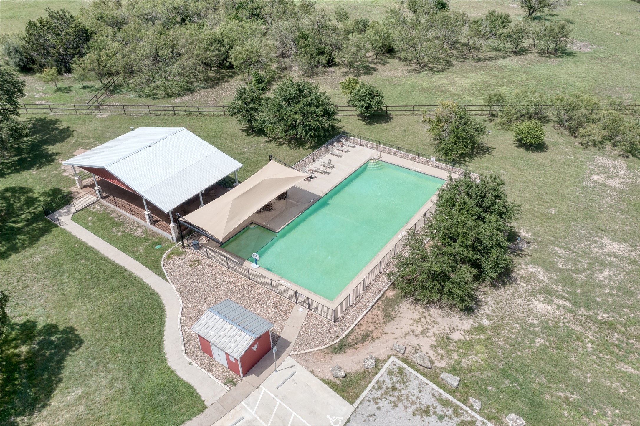 76 Balcones Ridge Way Bertram, TX 78605 - Photo 13 of 15 an aerial view of a house with a yard
