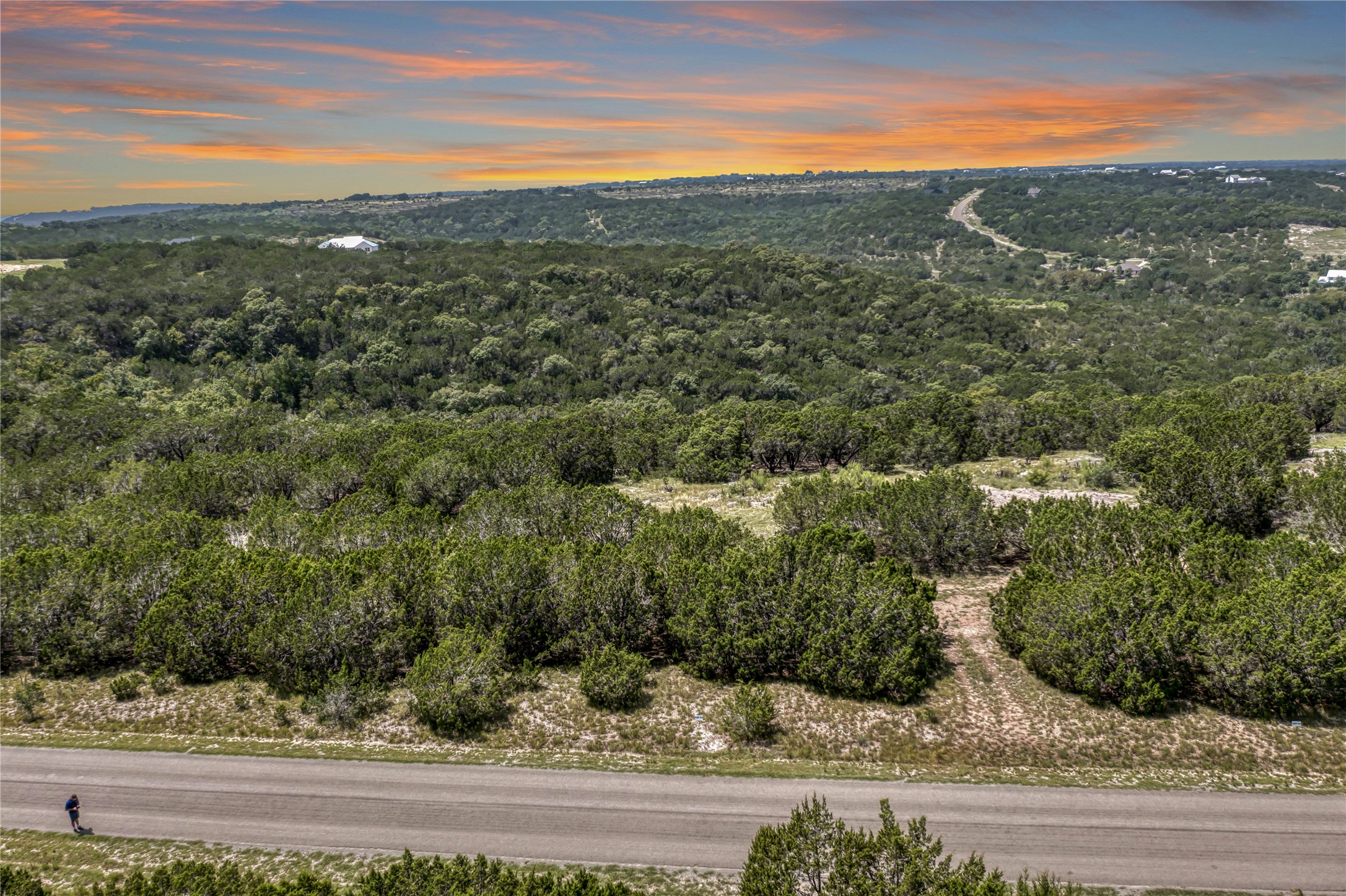 76 Balcones Ridge Way Bertram, TX 78605 - Photo 4 of 15 a view of a city from a yard