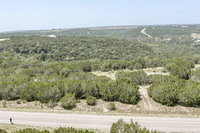 a view of a city from a yard