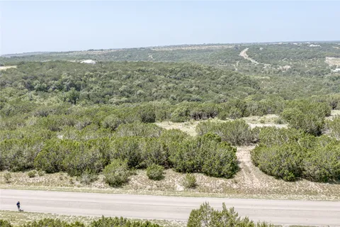 a view of a city from a yard